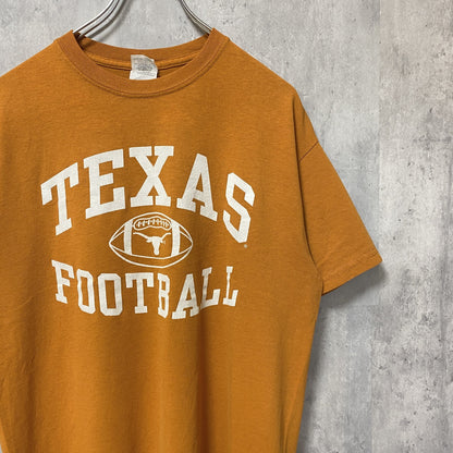 古着 used　GILDAN ギルダン　NCAA　テキサス大学　半袖プリントTシャツ　ロングホーンズ　アメフト　オレンジ　Mサイズ