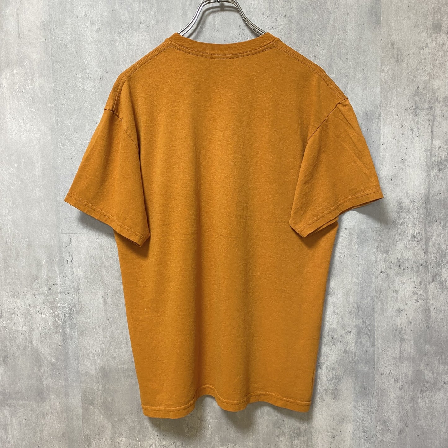 古着 used　GILDAN ギルダン　NCAA　テキサス大学　半袖プリントTシャツ　ロングホーンズ　アメフト　オレンジ　Mサイズ