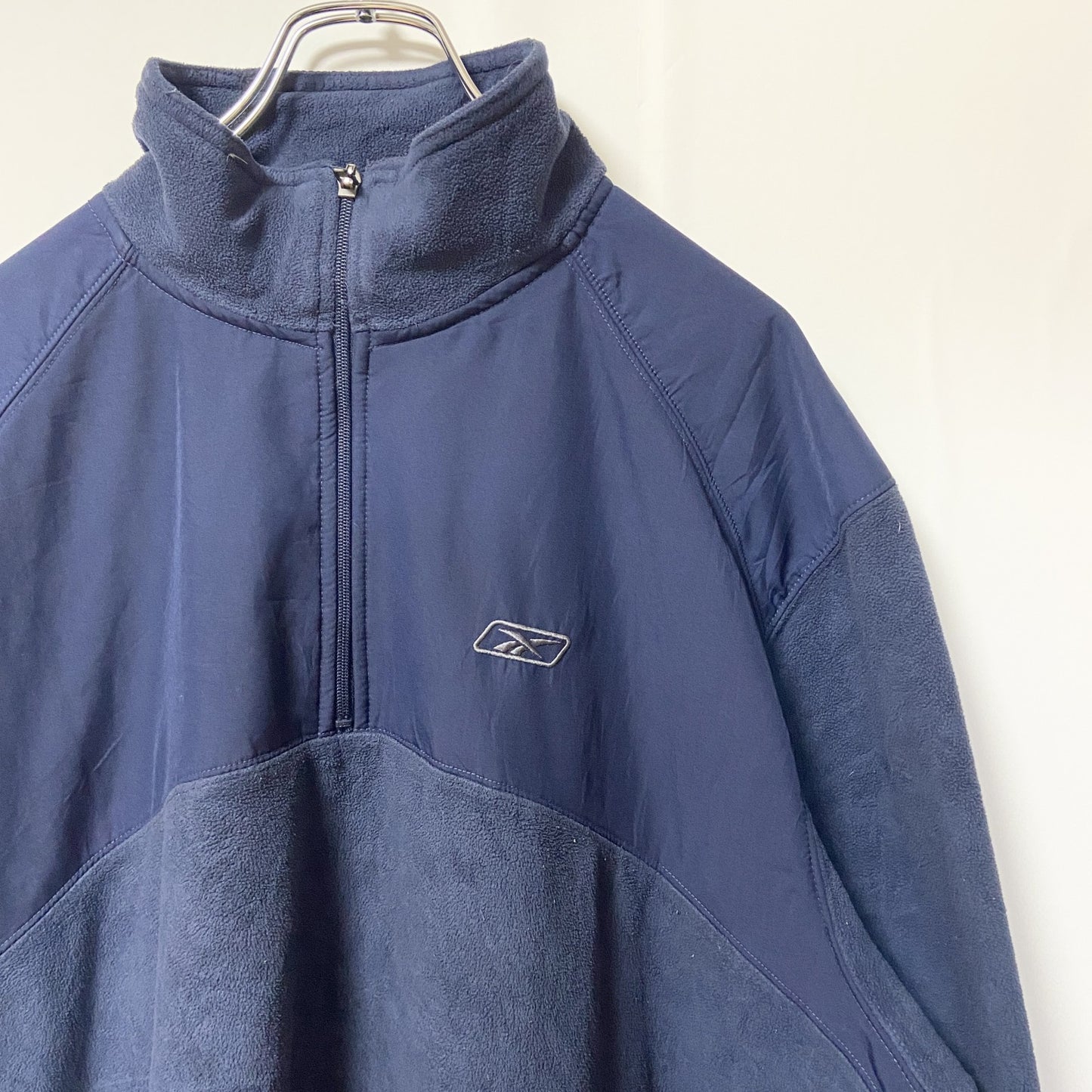 古着 used　Reebok リーボック　長袖ハーフジップフリースジャケット　紺　ネイビー　ワンポイント刺繡ロゴ　XLサイズ