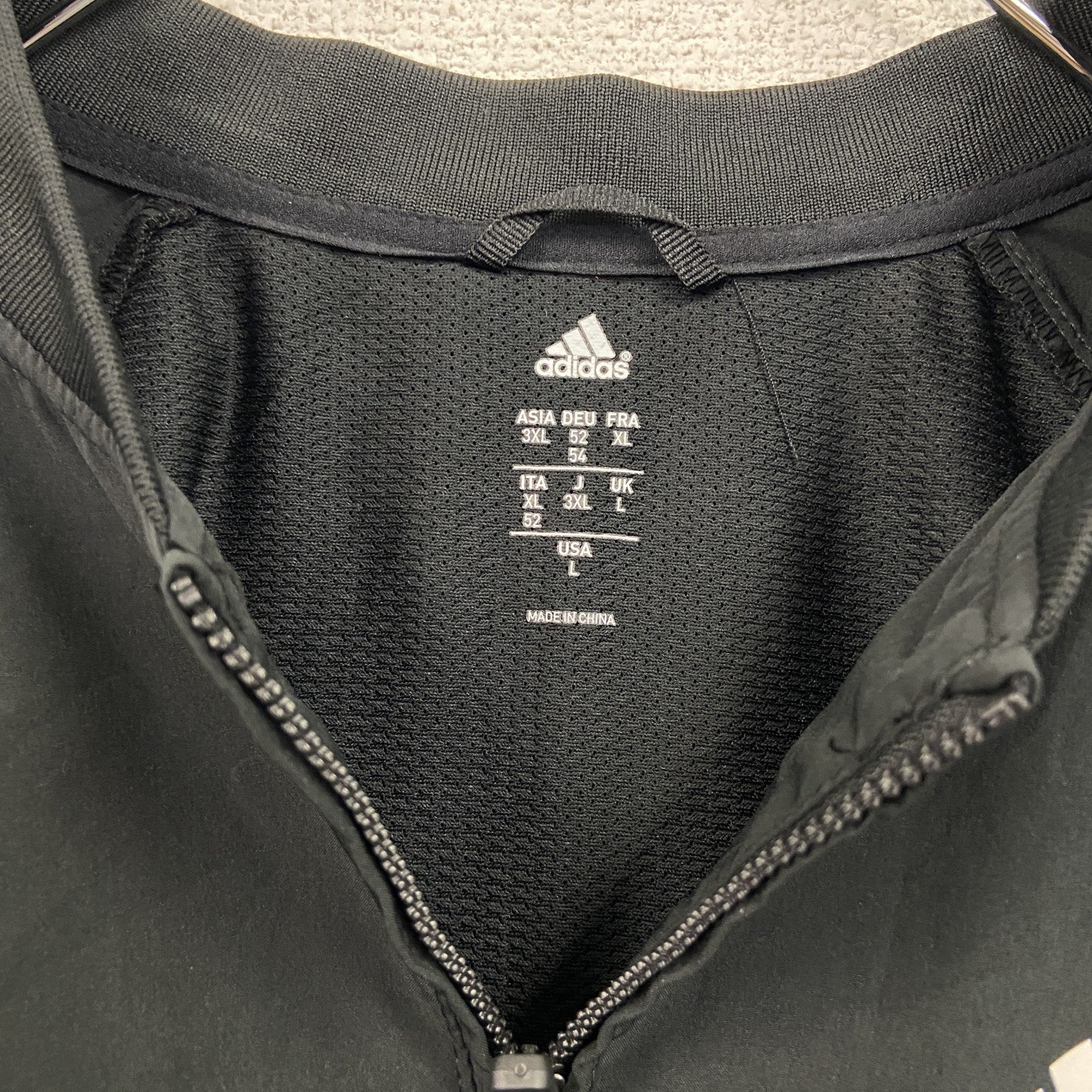 adidas　アディダス　半袖　ハーフジップナイロンジャケット　黒　ブラック　Lサイズ